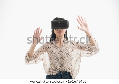 woman wearing virtual reality glasses. Amazing experience in abstract vr world. picture