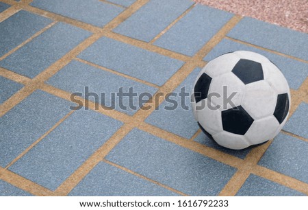 Soccer Ball or Football Ball on The Floor Used in The Sport of Association Football. One of Most Popular Sports in The World.