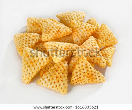 Crispy and crunchy Salty wheat 3d Triangle shape, Papad, tri angle corn puff, fryums or frymus, snack food, Indian Pouch Packing Street Food, selective focus - Image Royalty-Free Stock Photo #1616833621