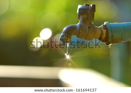Defective faucet. Cause wastage of water Royalty-Free Stock Photo #161694137
