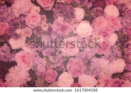 Love background of Beautifu artificial flower bouquet with pink vintage filter