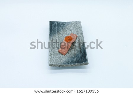 Sushi and sashimi on  stone plate, White background