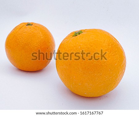 Orange fruits on white background Royalty-Free Stock Photo #1617167767