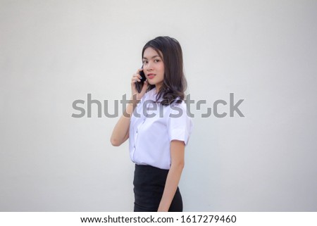 thai adult student university uniform beautiful girl calling smart phone