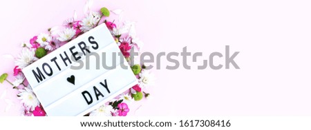 Banner for the site with a lightbox and the inscription Mother's Day.