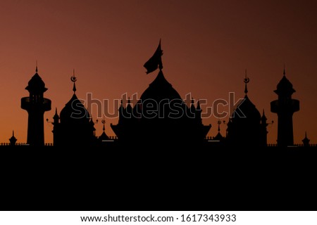 silhouette of muslim mosque dome with half moon on twilight background.concept for ramadan and prayer time background