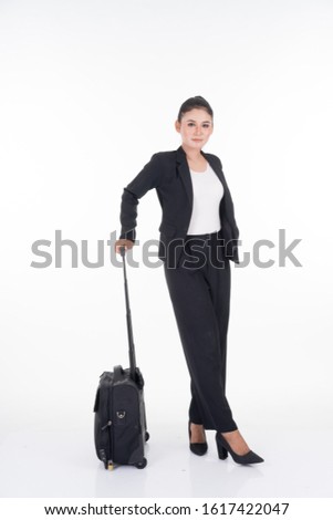 Businesswoman on a business trip, with luggage isolated on white background. Suitable for cut out, manipulation or composite works for travel or business concept.