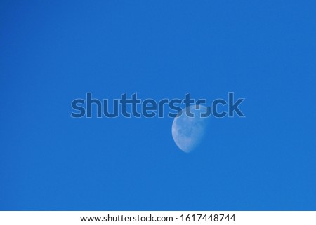 Half Moon and Blue Sky During the Morning
