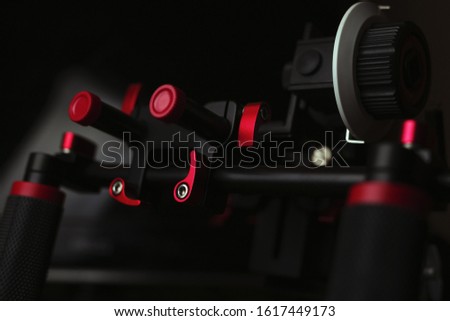 videographer technique on a dark background, suitable for the website header on the topic of cinema and video