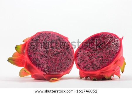 A Dragon fruit cut into two isolated on white background