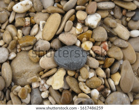 Pebbles background, black sea beach.