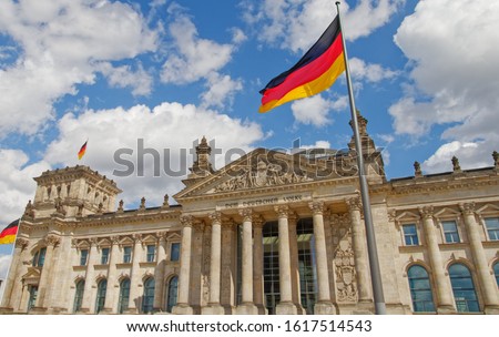 German Parliament  building Reichstag Deutscher Bundestag in Berlin, Germany . The dedication Dem deutschen Volke,meaning To the German people, on the frieze. Royalty-Free Stock Photo #1617514543