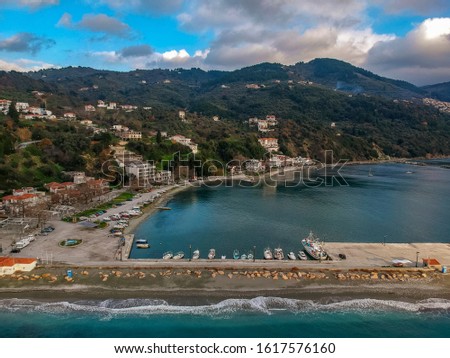 Aerial view of the coastal seaside village Loutraki and the port located in Glossa during winter period. Skopelos island, Sporades, Greece