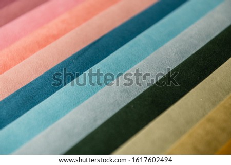 Multicolored fabric backgrounds. velor striped background. abstraction. Wallpaper. textile. color palette