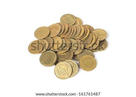 Heap of israeli coins isolated on white background