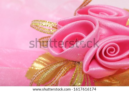 Artificial pink rose bouquet with copyspace for text
