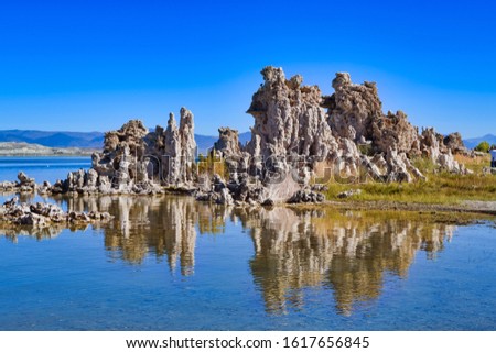 Mono Lake, California. saline soda lake in Mono County. Terminal lake in an endorheic basin. Lack of an outlet causes high levels of salts to accumulate in the lake. Clear blue water. Rock formation.