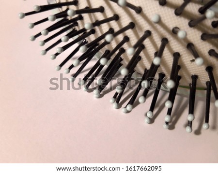 Close up photo about a hairbrush.