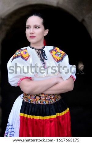 Young beautiful slovak woman in traditional costume.