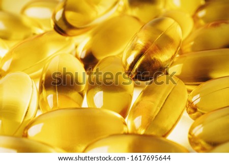 Omega 3 vitamin supplement gel capsules or Fish Oil, Cod liver oil medicines, macro photo.
