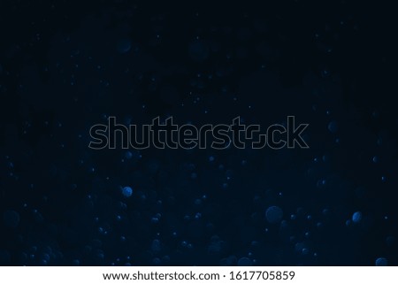 Abstract bokeh lights with light Blue background
