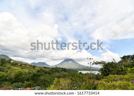 view of mountains, photo as a background ,taken in Arenal Volcano lake park in Costa rica central america