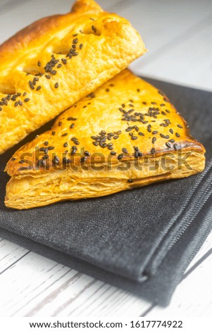 Puff Pastries on black napkin. Shallow Depth of field.