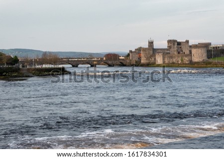 Ireland, Limerick. Old royal castle, river and bridge