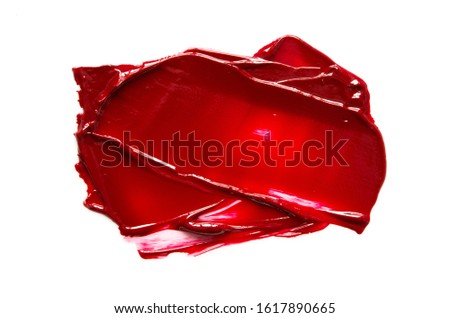Smear and texture of red lipstick or oil paint isolated on white background. - Image
