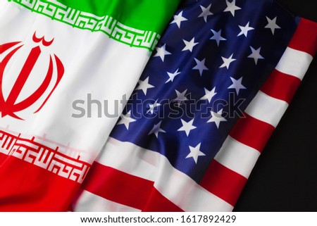 Flag of Iran together with flag of the United States of America
