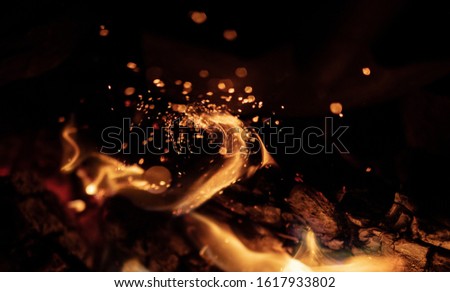 Photos of orange bokeh from a flame