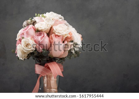 wedding bride's bouquet. vintage toned picture. Dark background