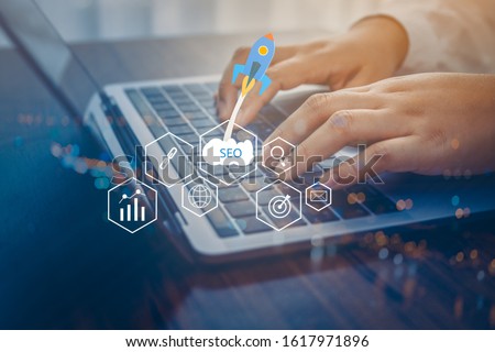 SEO Search Engine Optimization concept with laptop computer. ranking traffic on website, internet technology for business company. Royalty-Free Stock Photo #1617971896