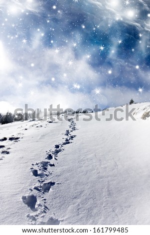 Christmas background with stars and footsteps in the snow