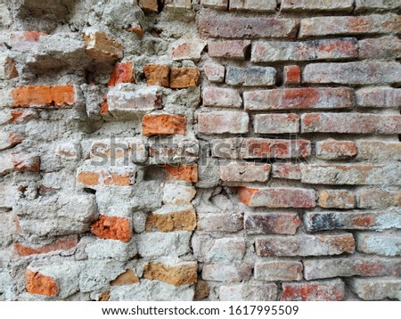 Broken red brick wall material