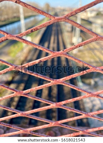 Steel mesh on the railroad crossing.