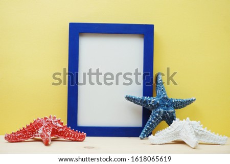 photo frame space copy mock up and starfish decoration