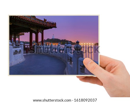 Hand and Sunset In the Beihai Park - Beijing China (my photo) isolated on white background
