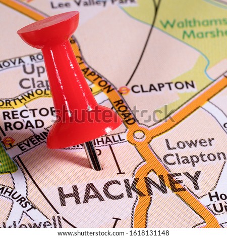 A pin marking the location of Hackney on a map of the United Kingdom.  Hackney is a district in East London.  It is the administrative centre of the London Borough of Hackney. Royalty-Free Stock Photo #1618131148