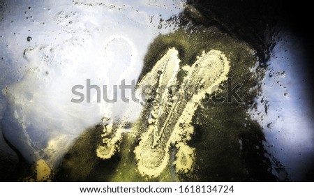 Reflection of colors in water, space, cosmos concept isolated on black background, nebula effect texture 