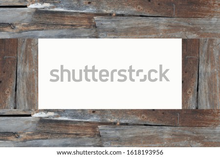 empty frame on wooden wall background