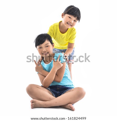 Two girls playing on white
