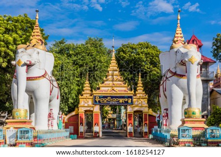 MONYWA , MYANMAR - DECEMBER 01, 2016 : entrance of the Thanboddhay Phaya temple with his giant elephants statues