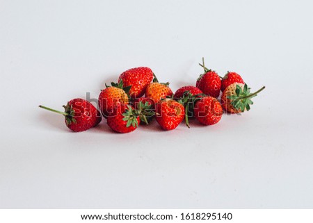 Beautiful red strawberries on white background Royalty-Free Stock Photo #1618295140