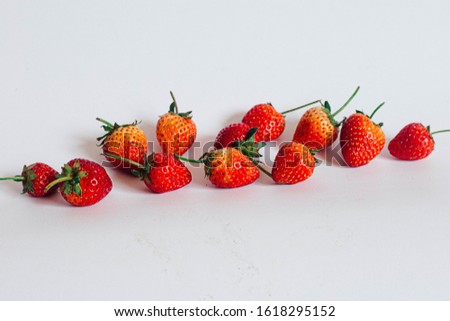 Beautiful red strawberries on white background Royalty-Free Stock Photo #1618295152