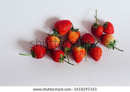 Beautiful red strawberries on white background Royalty-Free Stock Photo #1618295161
