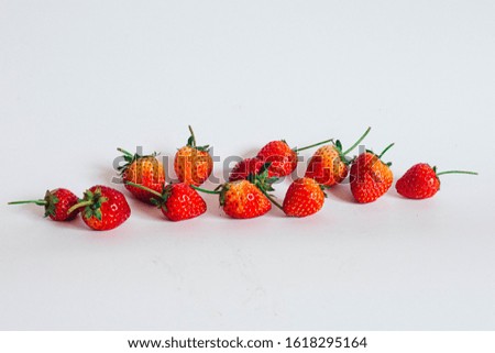 Beautiful red strawberries on white background Royalty-Free Stock Photo #1618295164