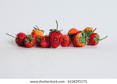 Beautiful red strawberries on white background Royalty-Free Stock Photo #1618295173