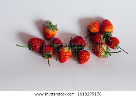 Beautiful red strawberries on white background Royalty-Free Stock Photo #1618295176