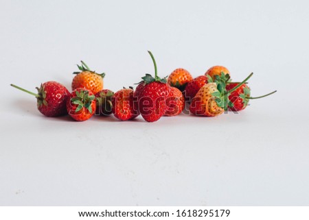Beautiful red strawberries on white background Royalty-Free Stock Photo #1618295179